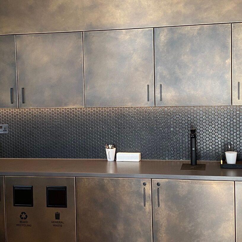 Elevating Elegance with Aged Brass Wall Cladding for the JJ Mack Building in London