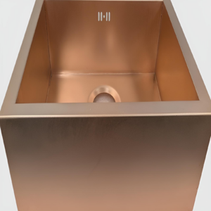 Farmhouse style apron-front copper sink with deep rectangular bowl