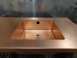 Seamless copper sink welded directly into a copper worktop