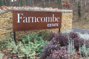 Corten estate sign with rusted finish – vintage outdoor metal signage for Farncombe.