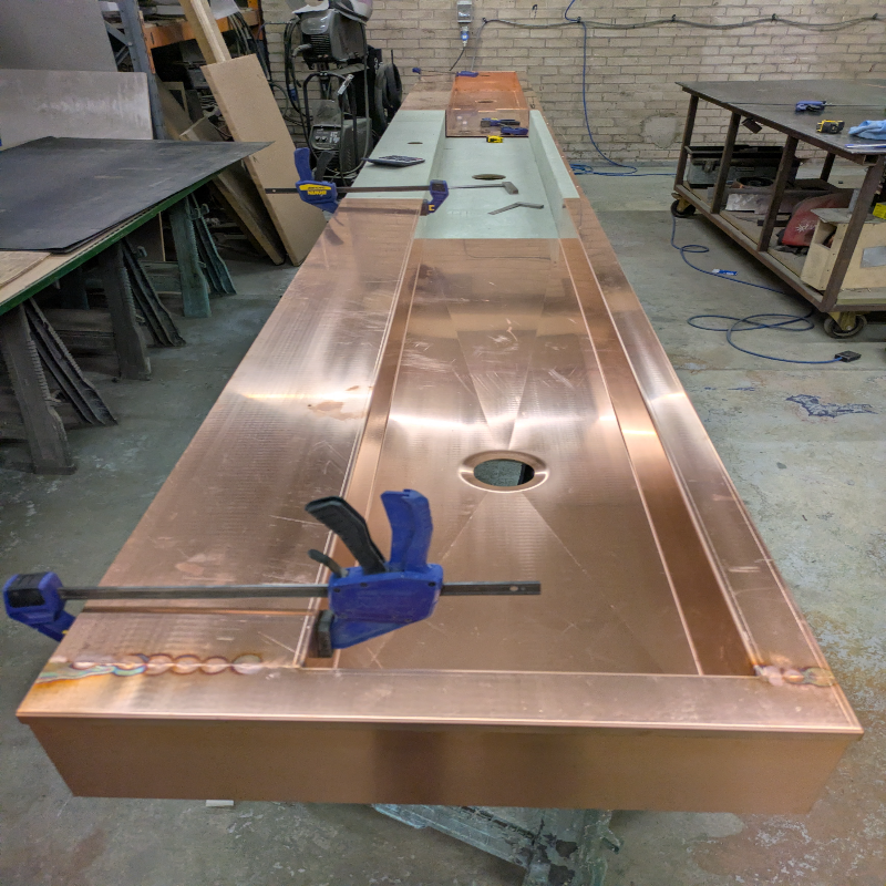 Six metre bespoke copper trough sink during fabrication in our Liverpool workshop