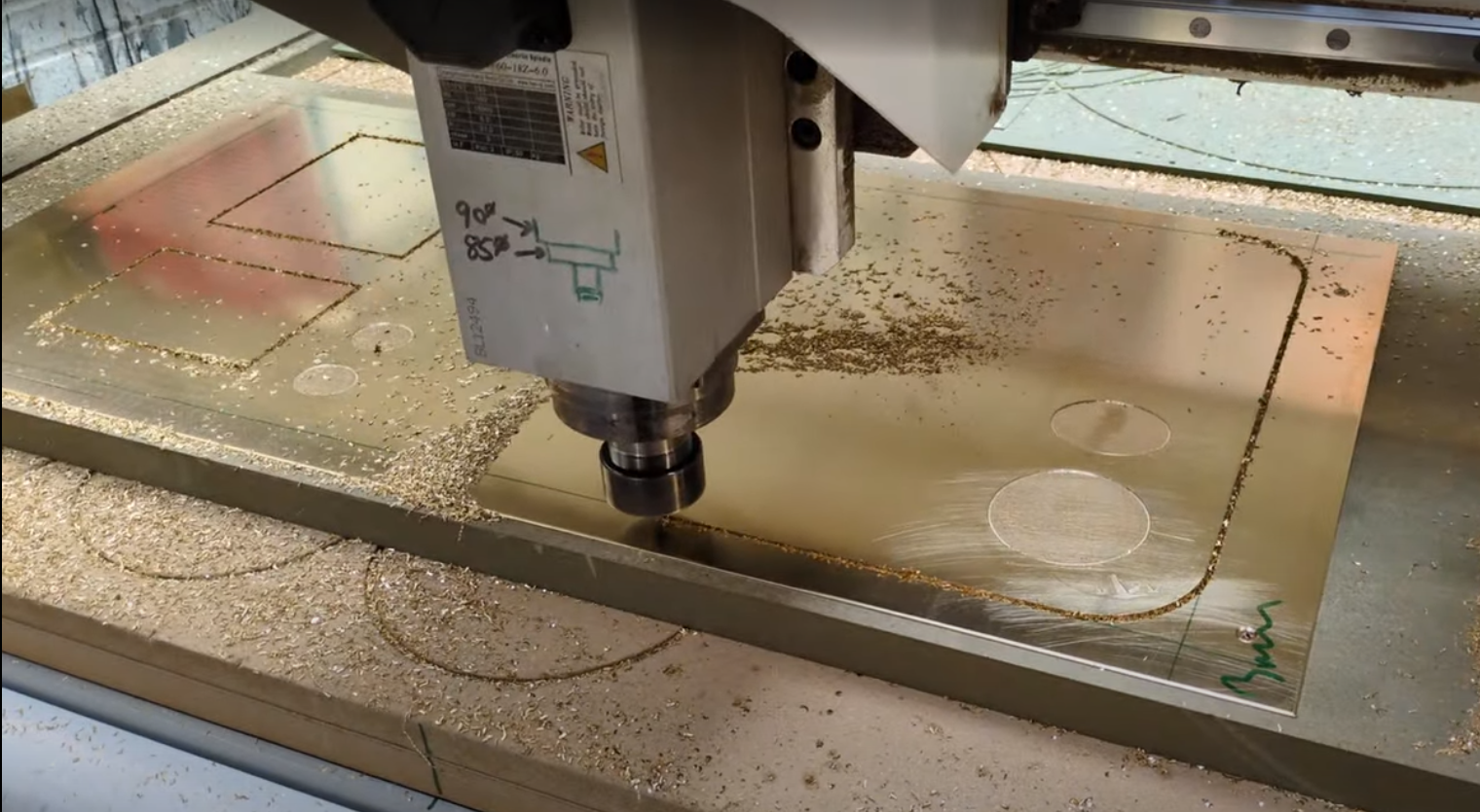 CNC machining antique brass components for a Grey Goose drinks cart in our Liverpool workshop
